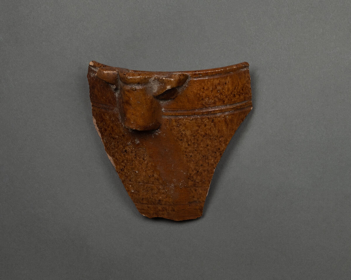 Fragment of a Vase, Earthenware; reddish body under brown glaze 