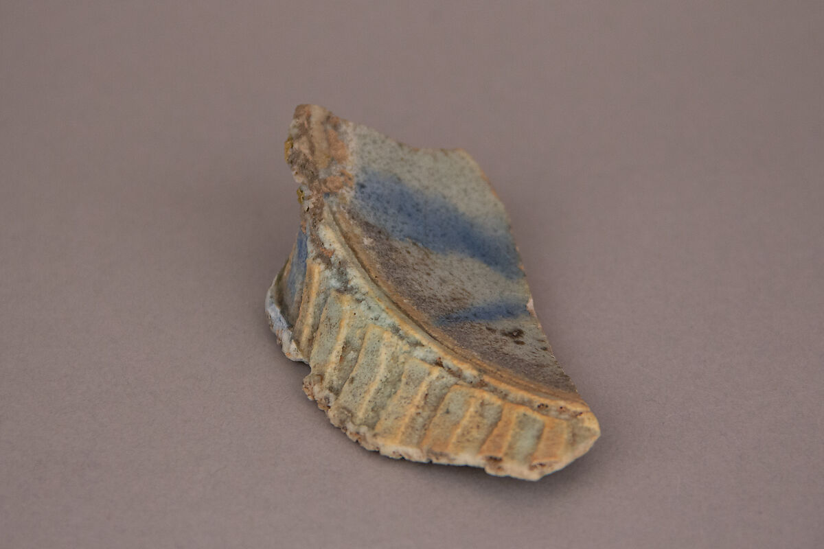 Fragment of a Waster, Earthenware; white gritty body under bluish glaze 