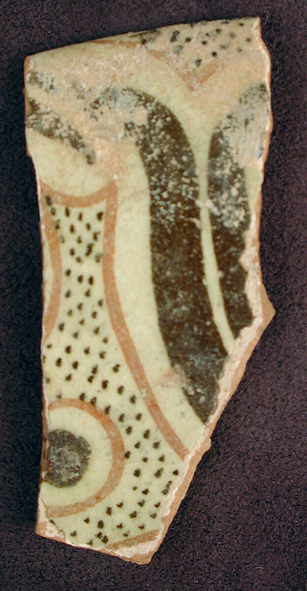 Fragment of a Bowl, Earthenware; white slip with polychrome slip decoration under transparent glaze 