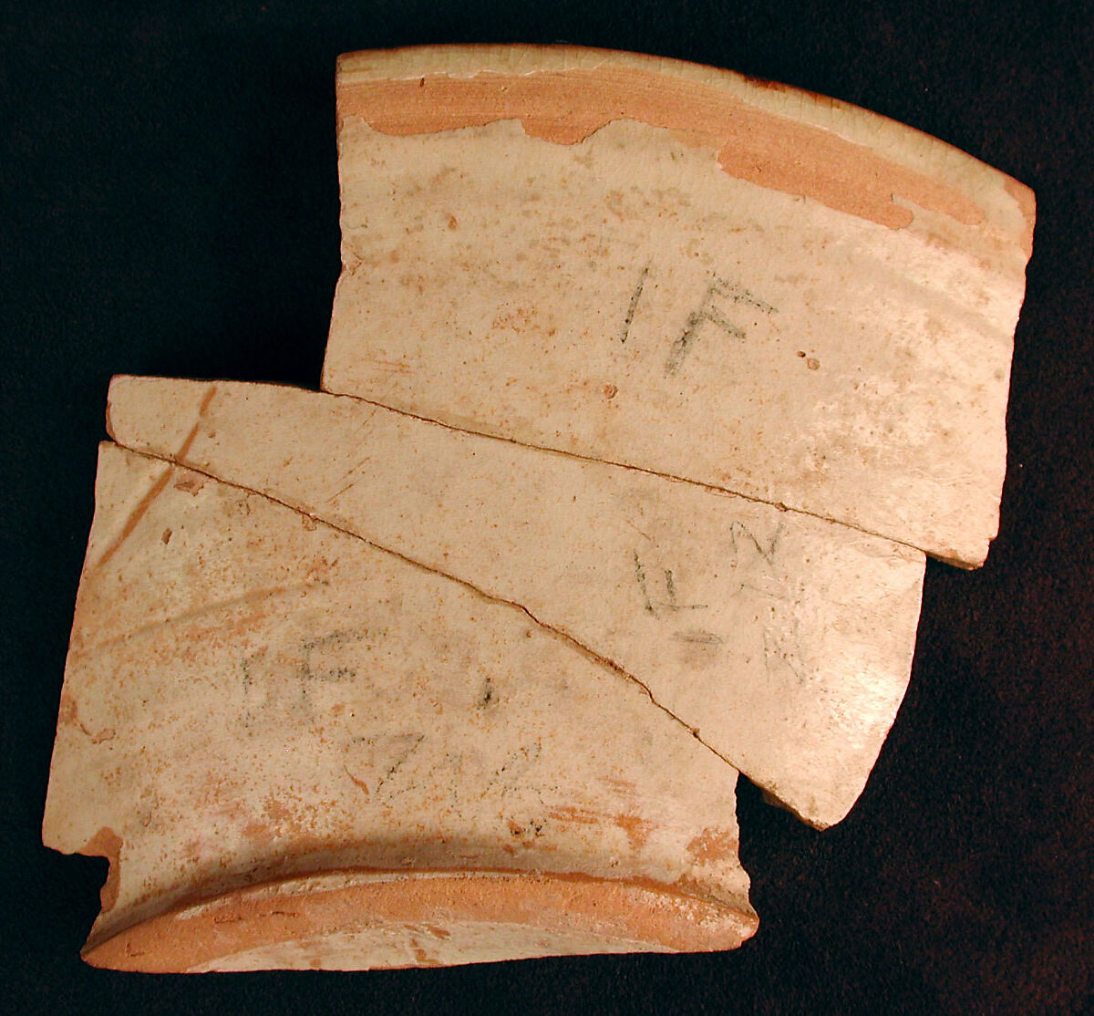 Fragment of a Bowl, Earthenware; white slip with black slip decoration under transparent glaze