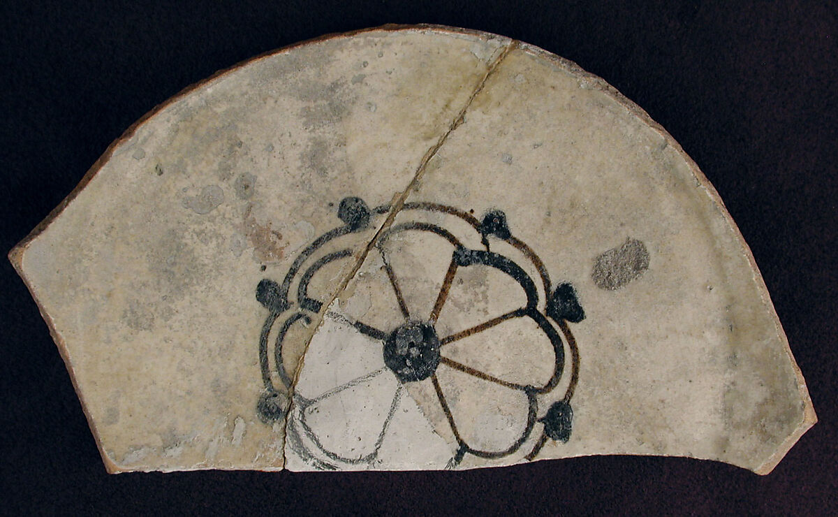 Fragment of a Bowl, Earthenware; white slip with black slip decoration under transparent glaze 