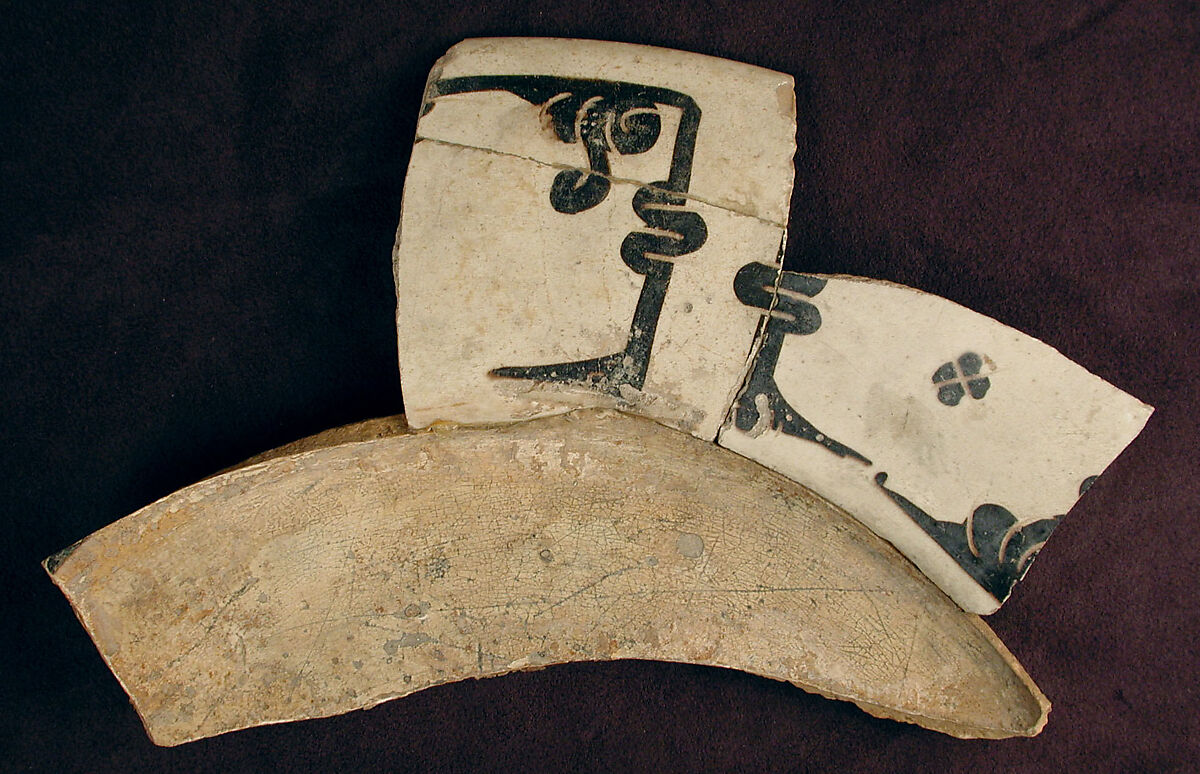 Plate Fragment, Earthenware; white slip with black slip decoration under transparent glaze 