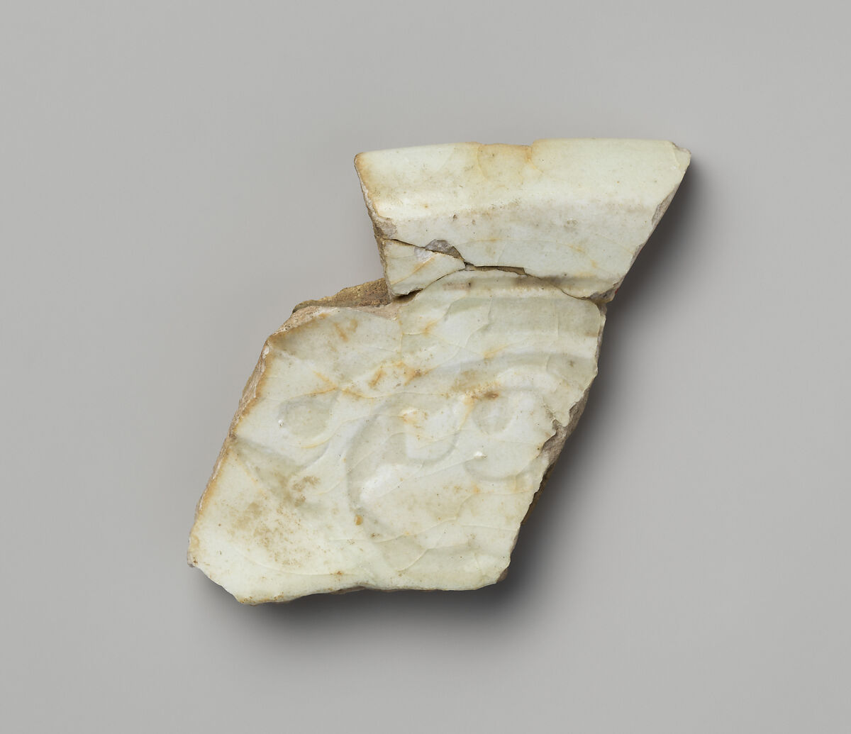 Fragment of Lid, Earthenware; molded and glazed 