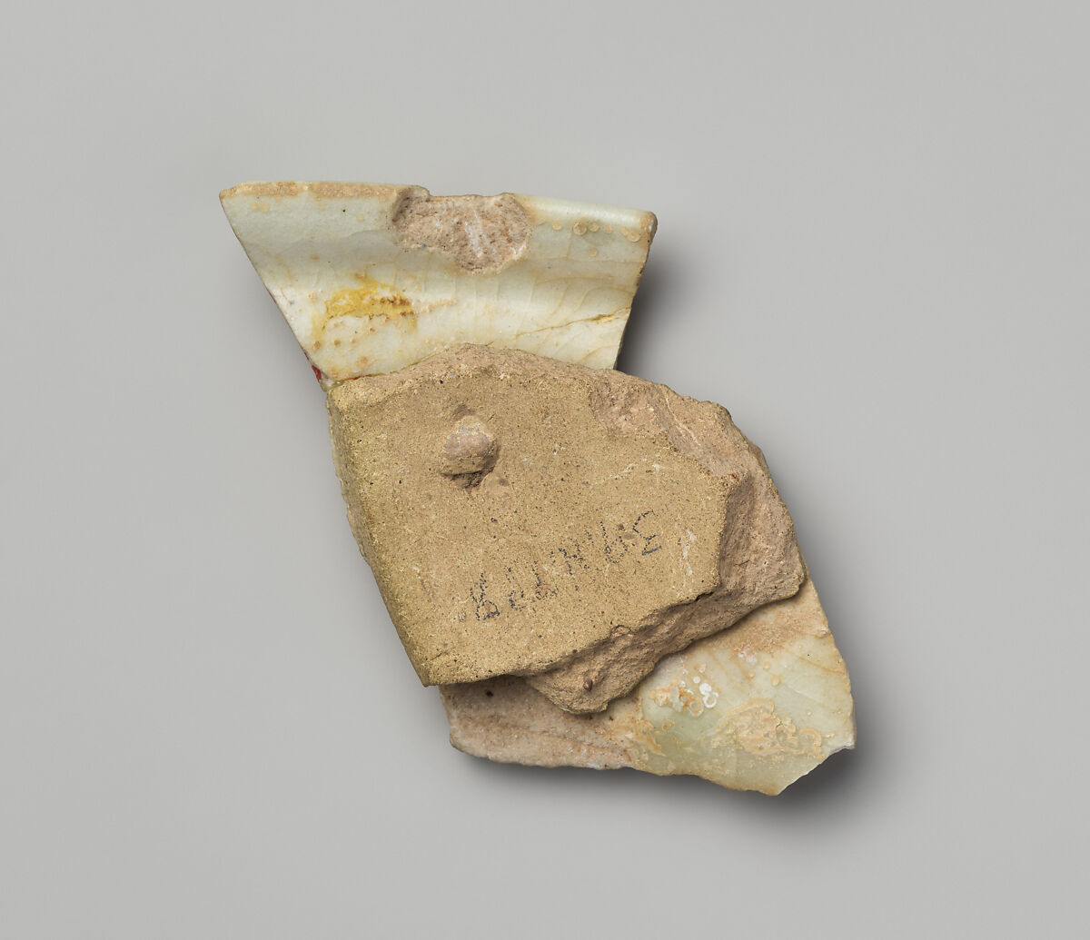 Fragment of Lid, Earthenware; molded and glazed