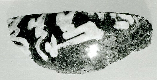 Fragment of a Jar, Earthenware; dark buff body, white slip on black ground under glaze 