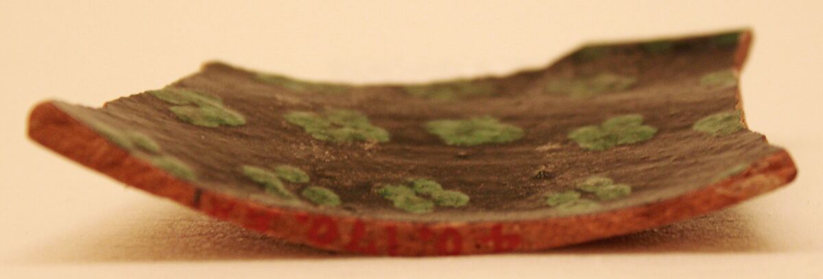 Fragment of a Bowl, Earthenware; reddish body, slip covered, green glaze