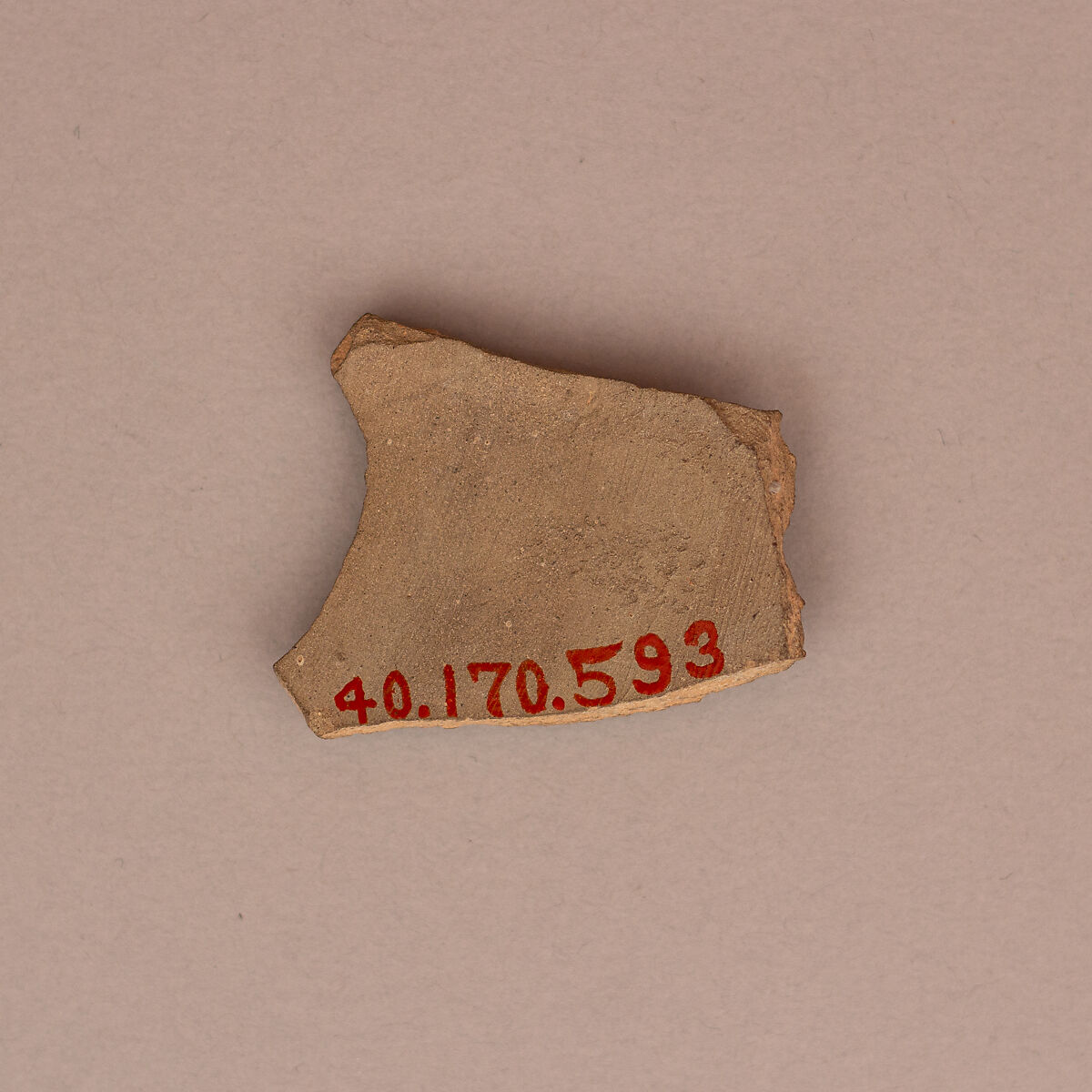Ceramic Fragment, Earthenware; slip covered and molded, unglazed
