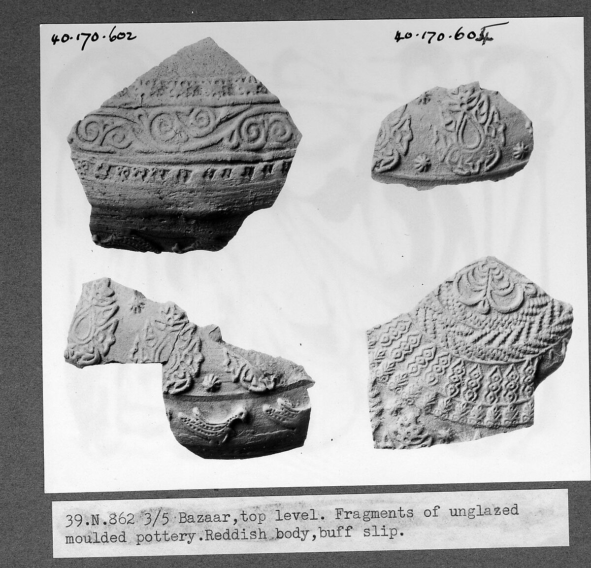 Fragment, Earthenware; slip covered and molded, unglazed 