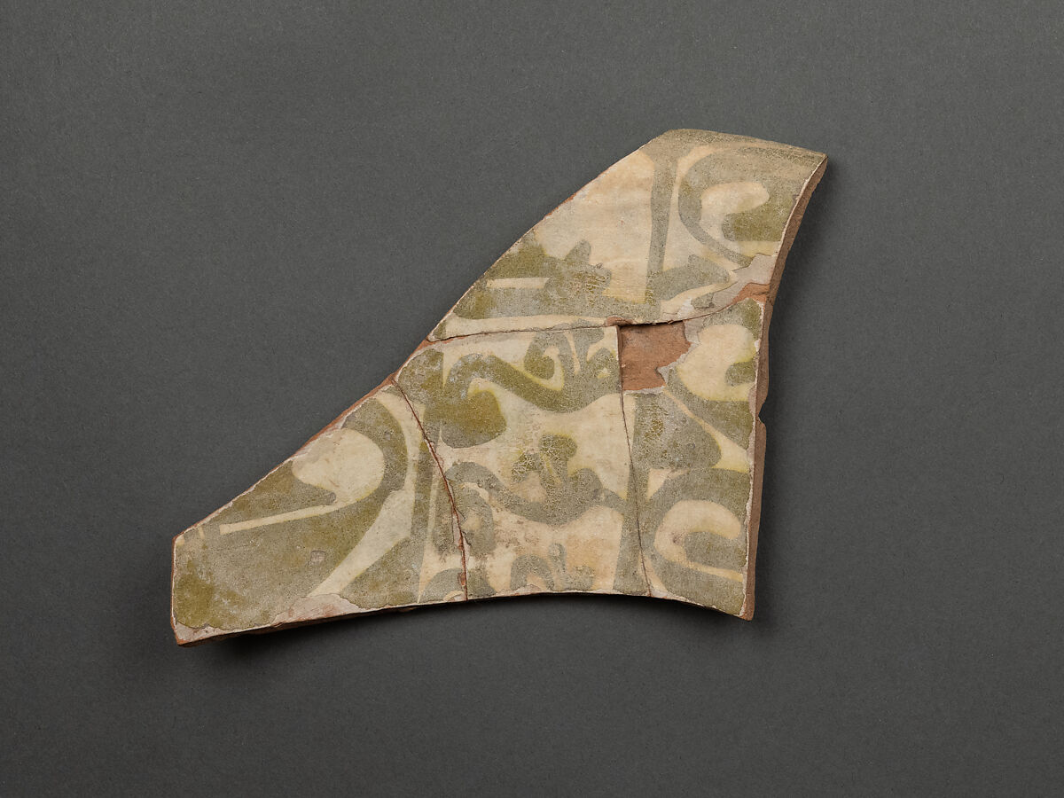 Fragment of a Bowl, Earthenware; white slip, green slip decoration, imitation luster, glaze