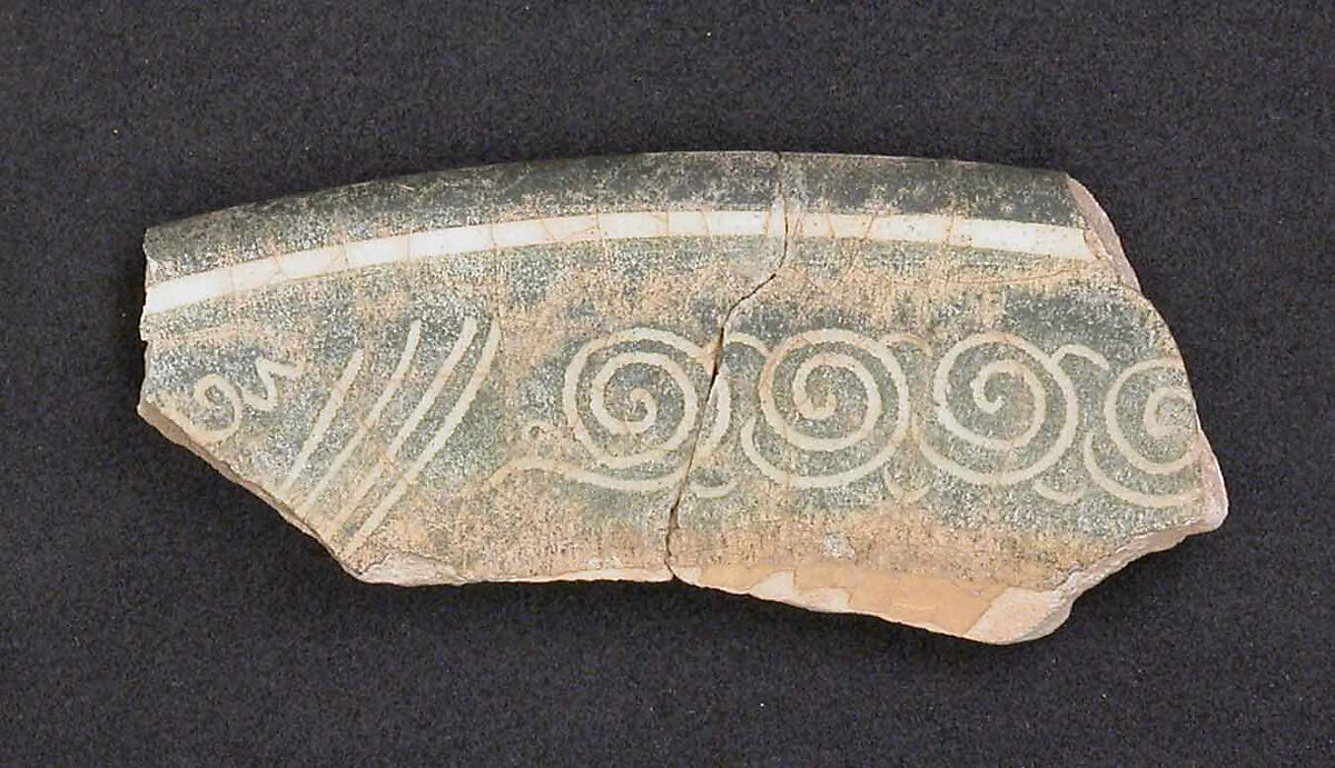 Fragment of a Dish, Stonepaste; gritty body, white and black decoration, sgraffito decoration under transparent glaze 