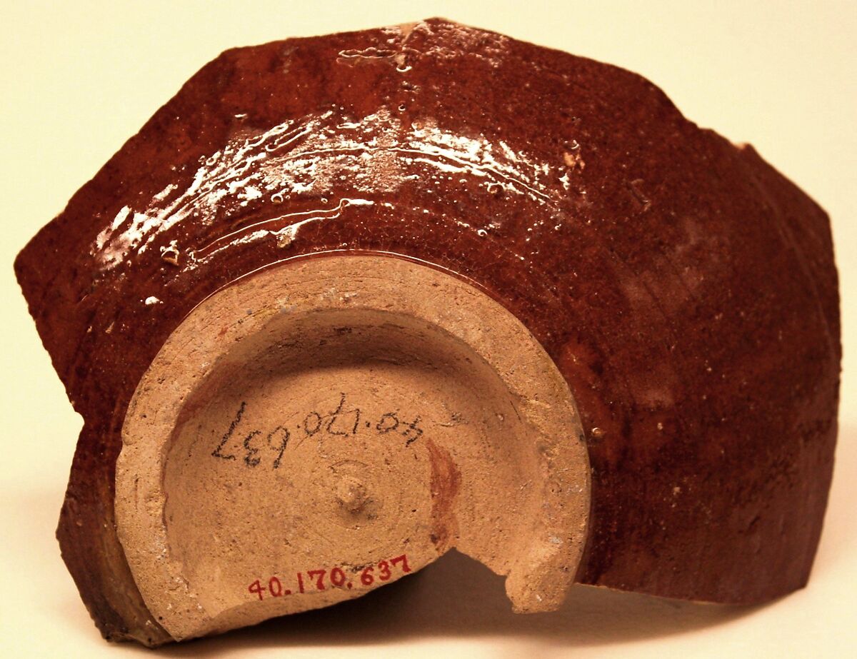 Waster of a Bowl with a Tripod Stuck Inside, Earthenware; gritty buff body, reddish brown and yellow streak decoration