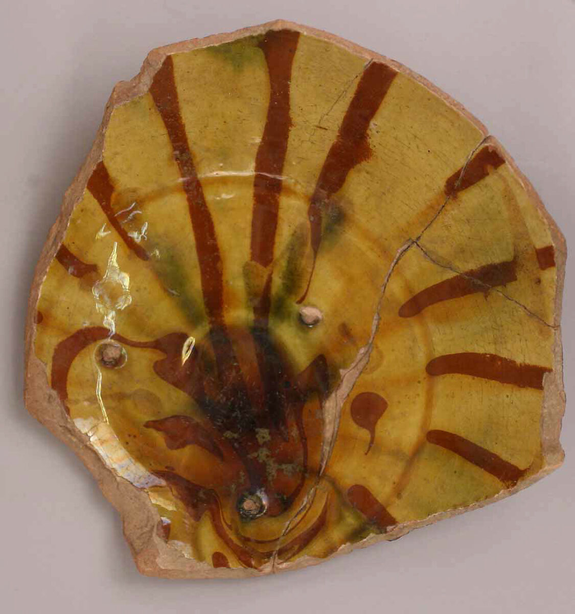 Fragment of a Bowl, Earthenware; gritty buff body, red and green decoration, glazed 
