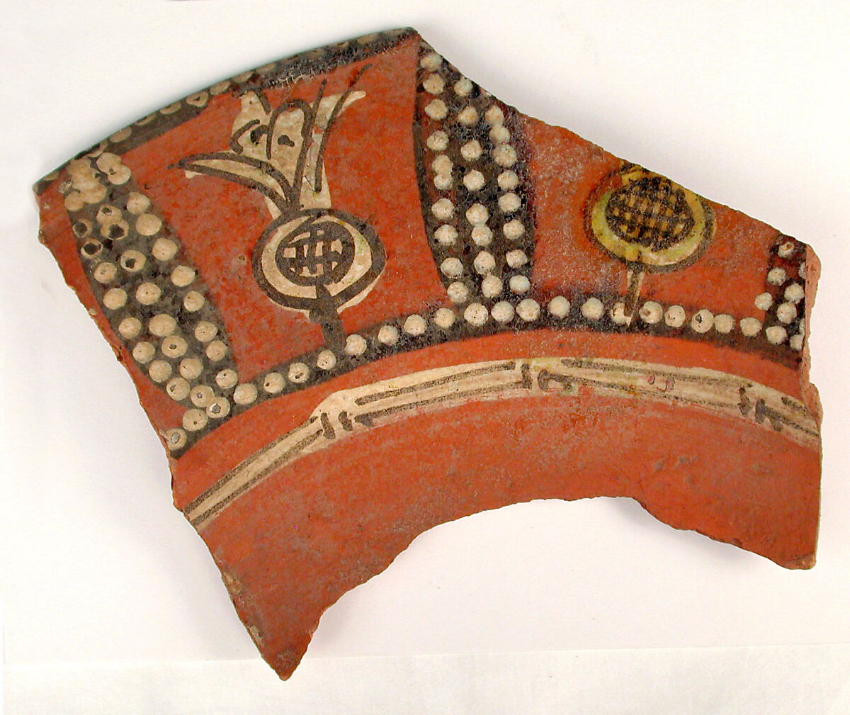 Fragment of Plate with Radish-like Motif, Earthenware; red slip with polychrome slip decoration under transparent glaze 