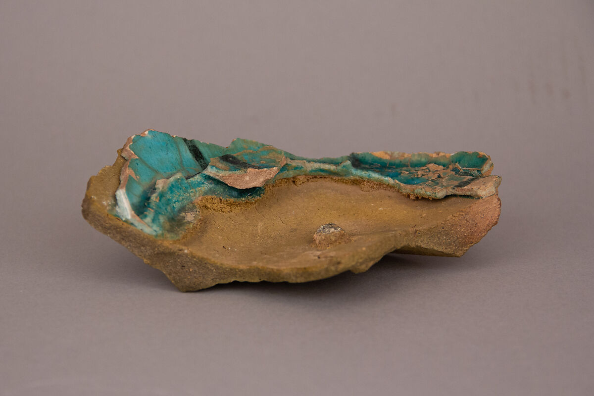 Fragment of a Waster, Earthenware; gritty white body, turquoise blue glaze and black stripes 