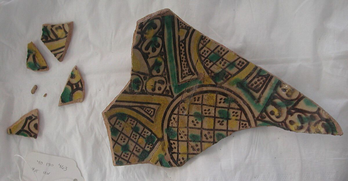 Fragments of a Bowl, Earthenware; underglaze painted in black slip and polychrome pigments under transparent glaze