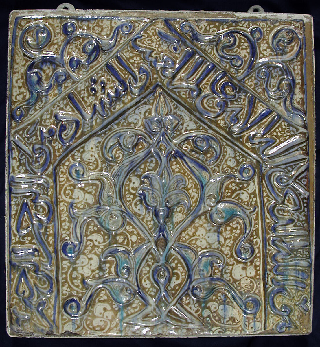 Tile with Niche Design and Inscription, Stonepaste; inglaze painted in blue, luster-painted on opaque white glaze, modeled decoration 