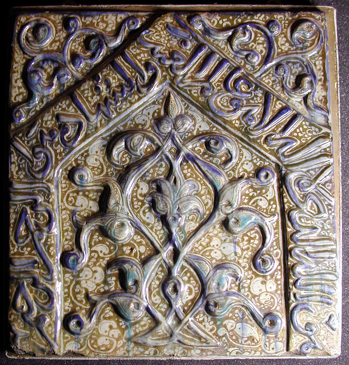 Tile with Niche Design and Inscription, Stonepaste; inglaze painted in blue, luster-painted on opaque white glaze, modeled decoration