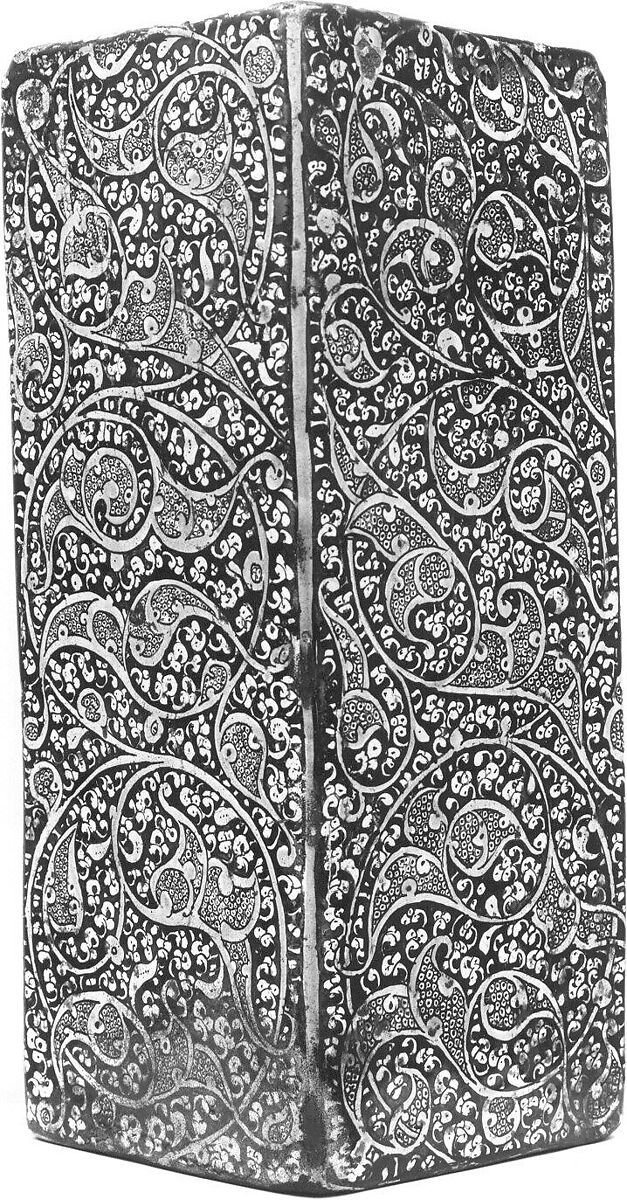 Corner Tile, Stonepaste; modeled, inglaze painted in blue and luster-painted on opaque white glaze