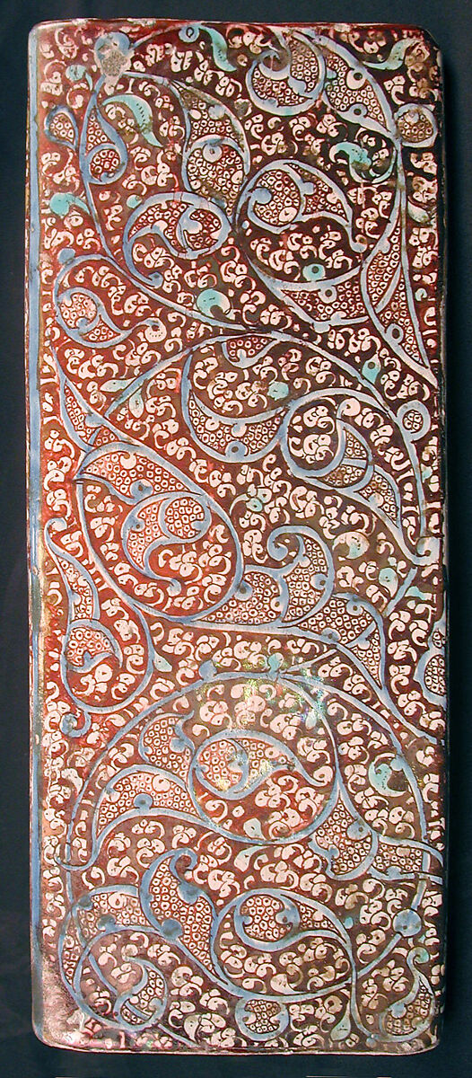 Corner Tile, Stonepaste; modeled, inglaze painted in blue and luster-painted on opaque white glaze