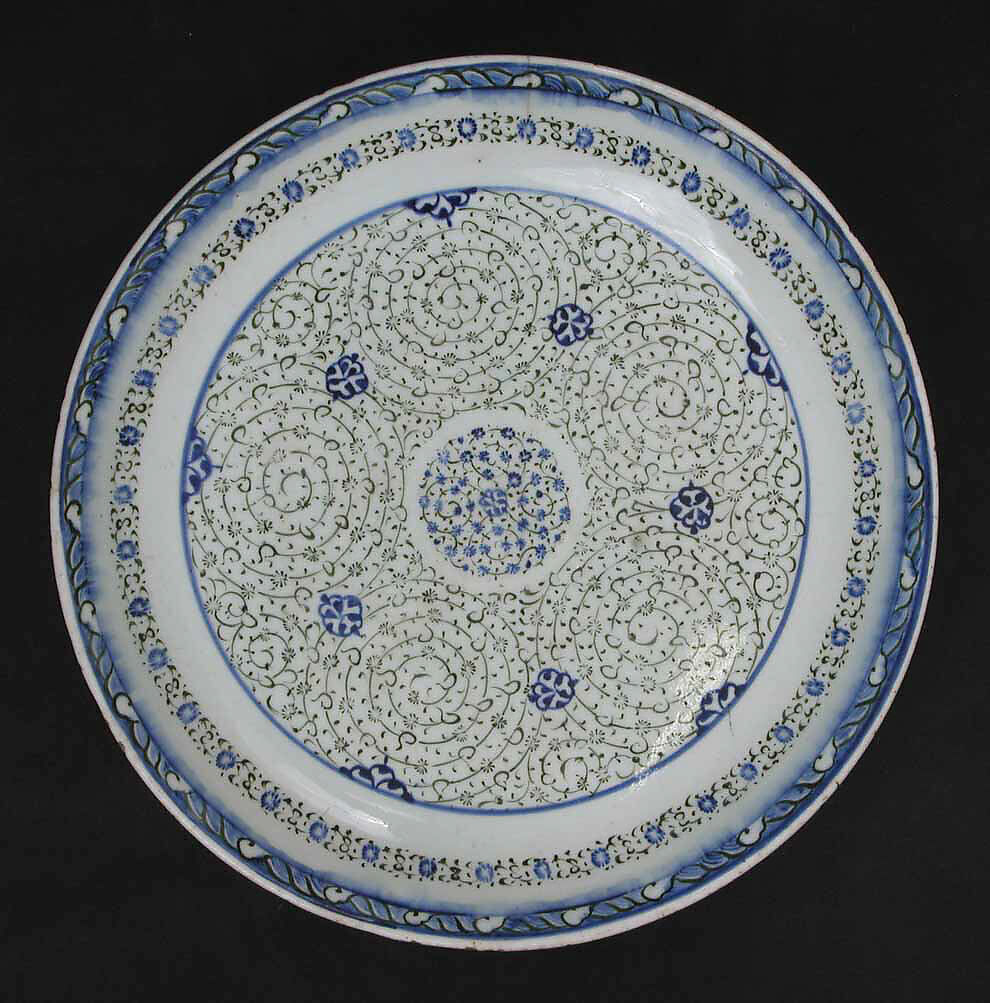 Dish with 'Tughra-illuminator' Design, Stonepaste; painted in blue under transparent glaze
