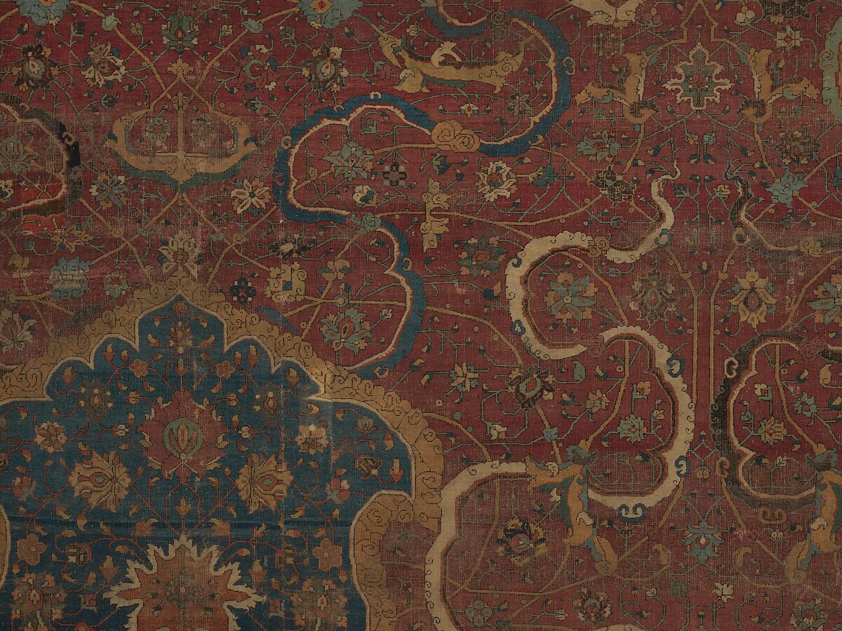 Carpet, Cotton (warp and weft), wool (pile); asymmetrically knotted pile 