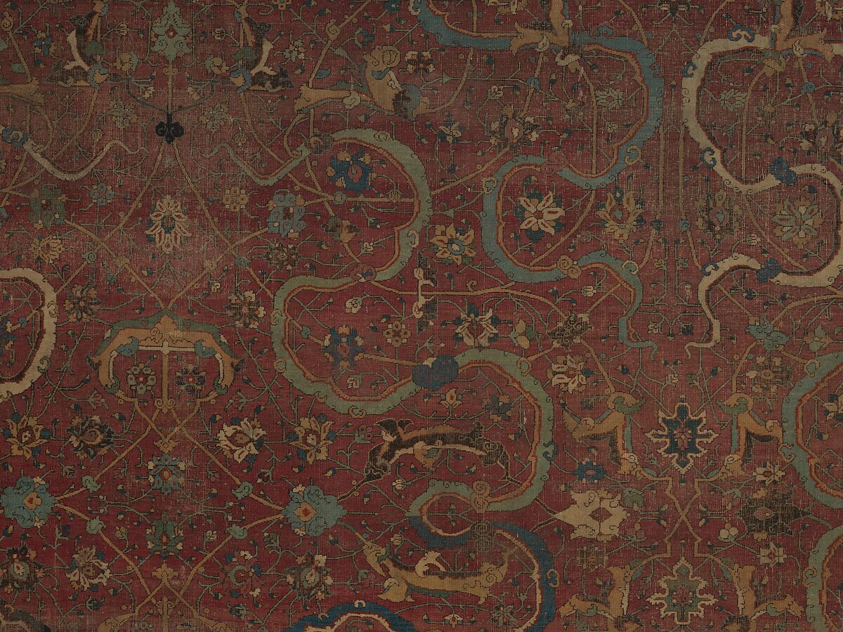 Carpet, Cotton (warp and weft), wool (pile); asymmetrically knotted pile 