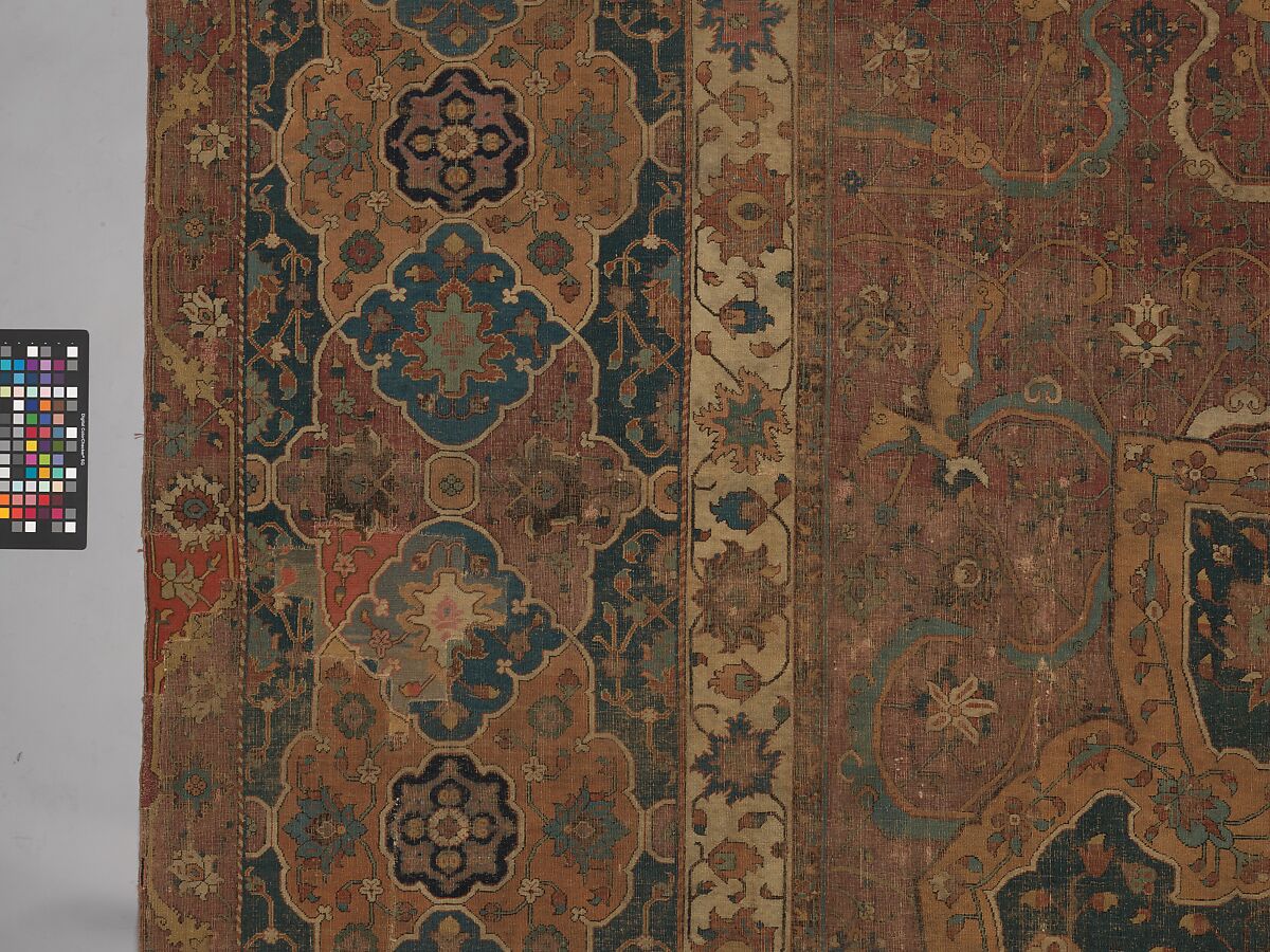 Carpet, Cotton (warp and weft), wool (pile); asymmetrically knotted pile 