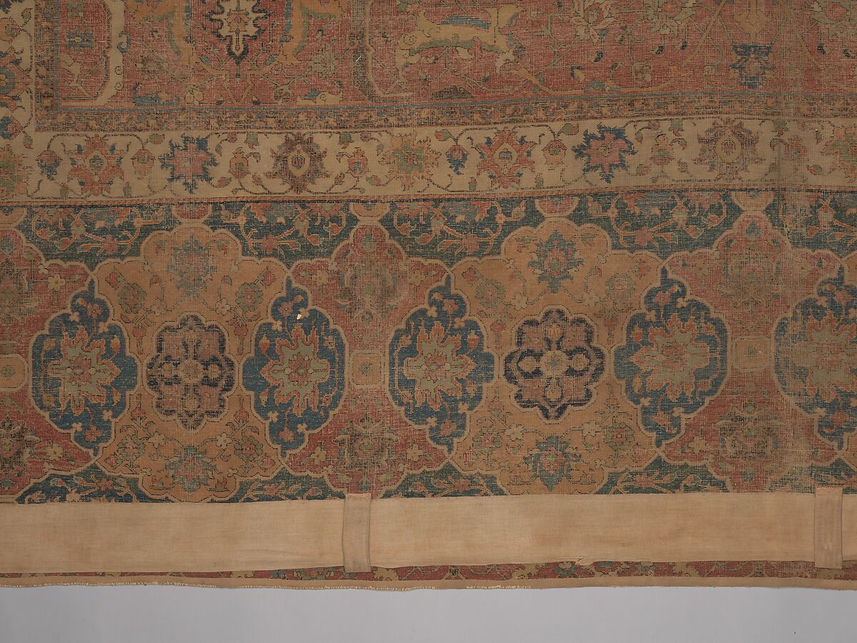 Carpet, Cotton (warp and weft), wool (pile); asymmetrically knotted pile 