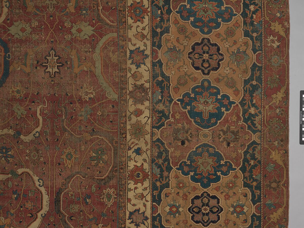 Carpet, Cotton (warp and weft), wool (pile); asymmetrically knotted pile 