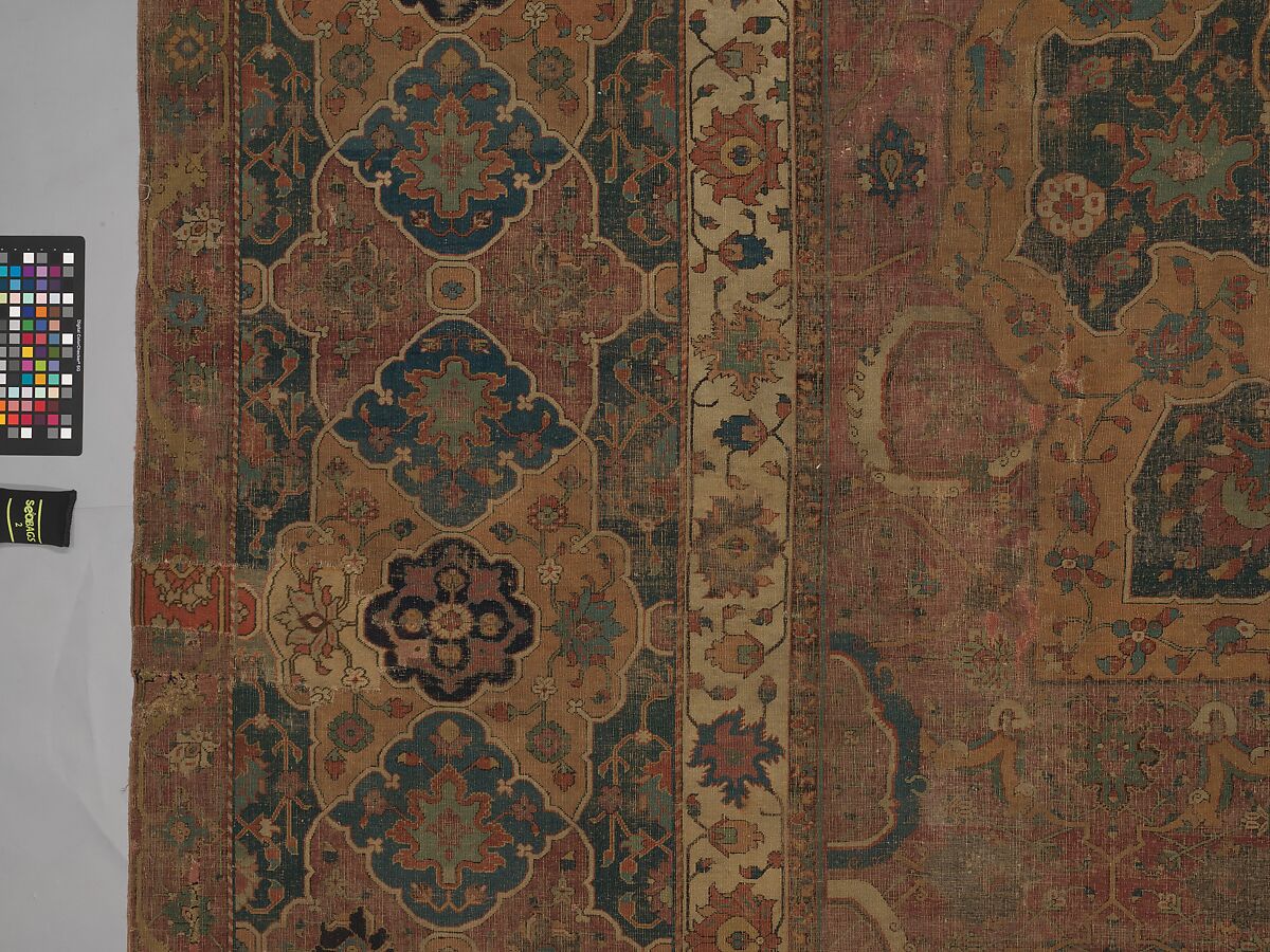 Carpet, Cotton (warp and weft), wool (pile); asymmetrically knotted pile 