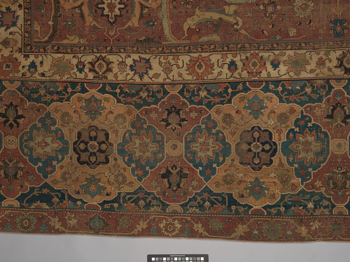 Carpet, Cotton (warp and weft), wool (pile); asymmetrically knotted pile 