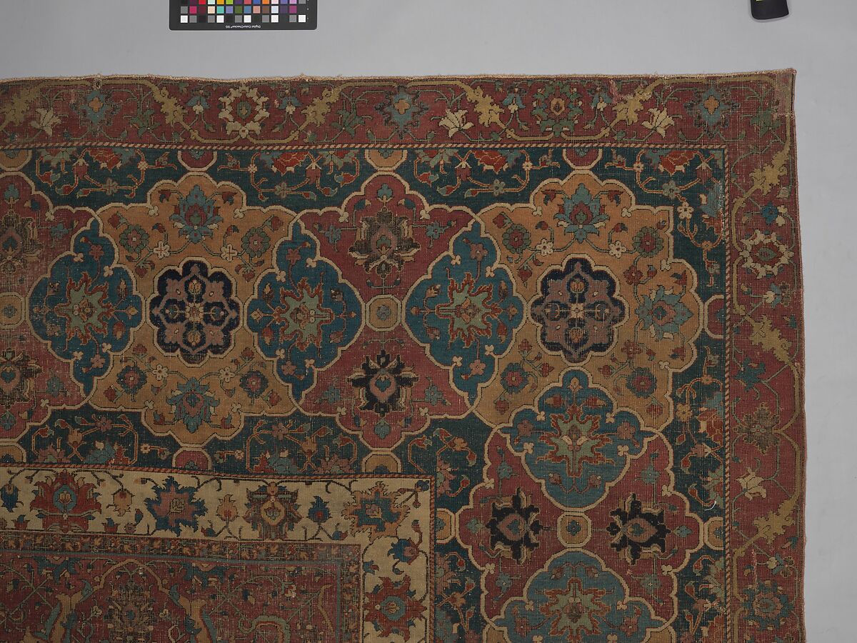 Carpet, Cotton (warp and weft), wool (pile); asymmetrically knotted pile 