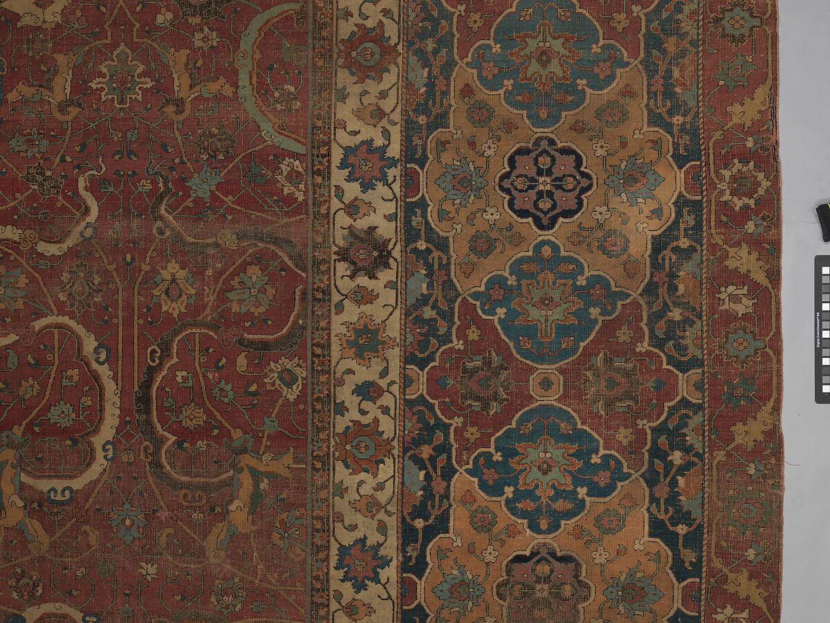 Carpet, Cotton (warp and weft), wool (pile); asymmetrically knotted pile 