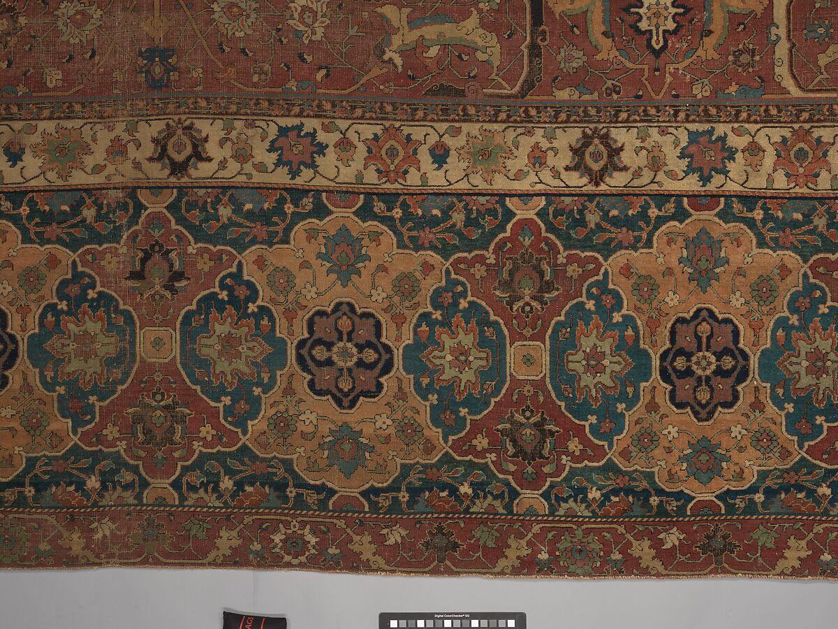 Carpet, Cotton (warp and weft), wool (pile); asymmetrically knotted pile 