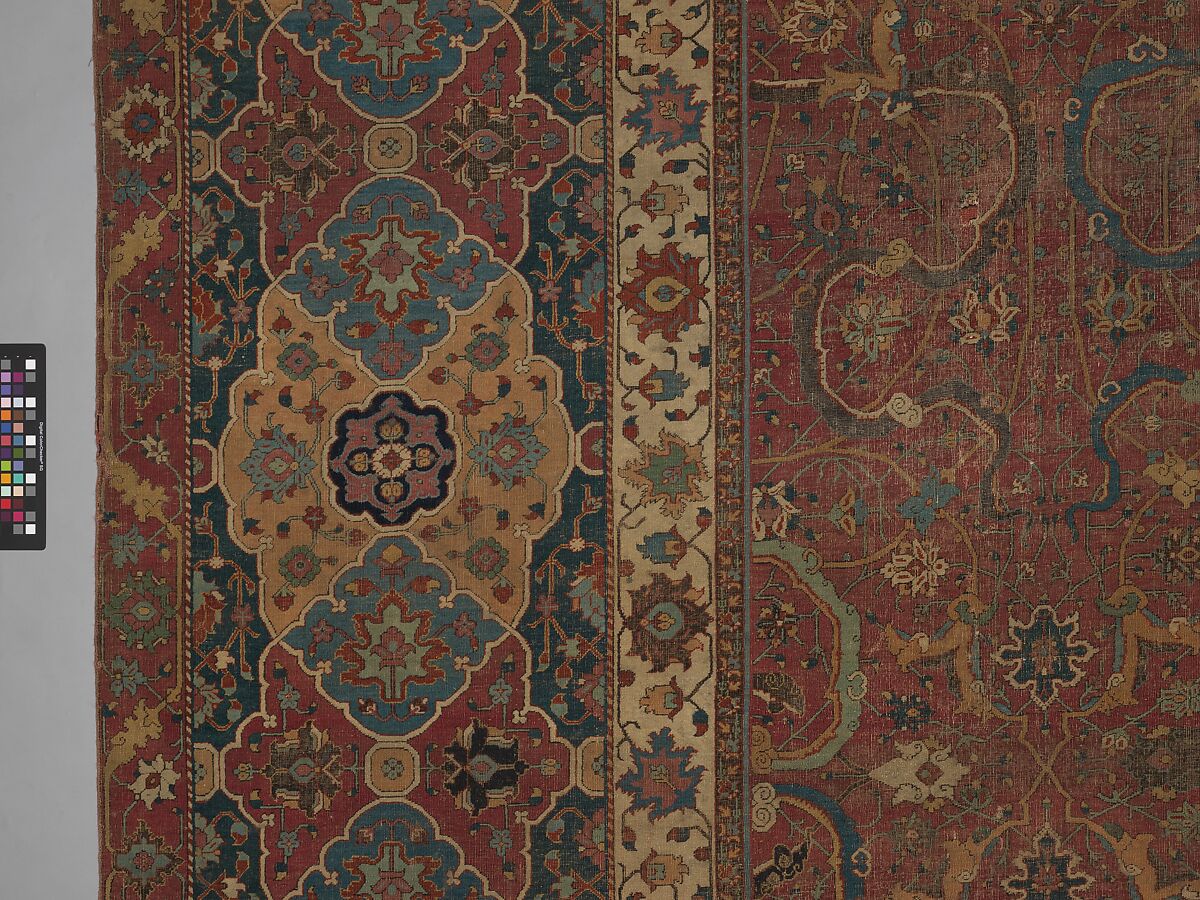 Carpet, Cotton (warp and weft), wool (pile); asymmetrically knotted pile 