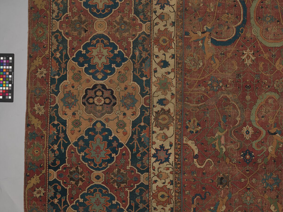 Carpet, Cotton (warp and weft), wool (pile); asymmetrically knotted pile 