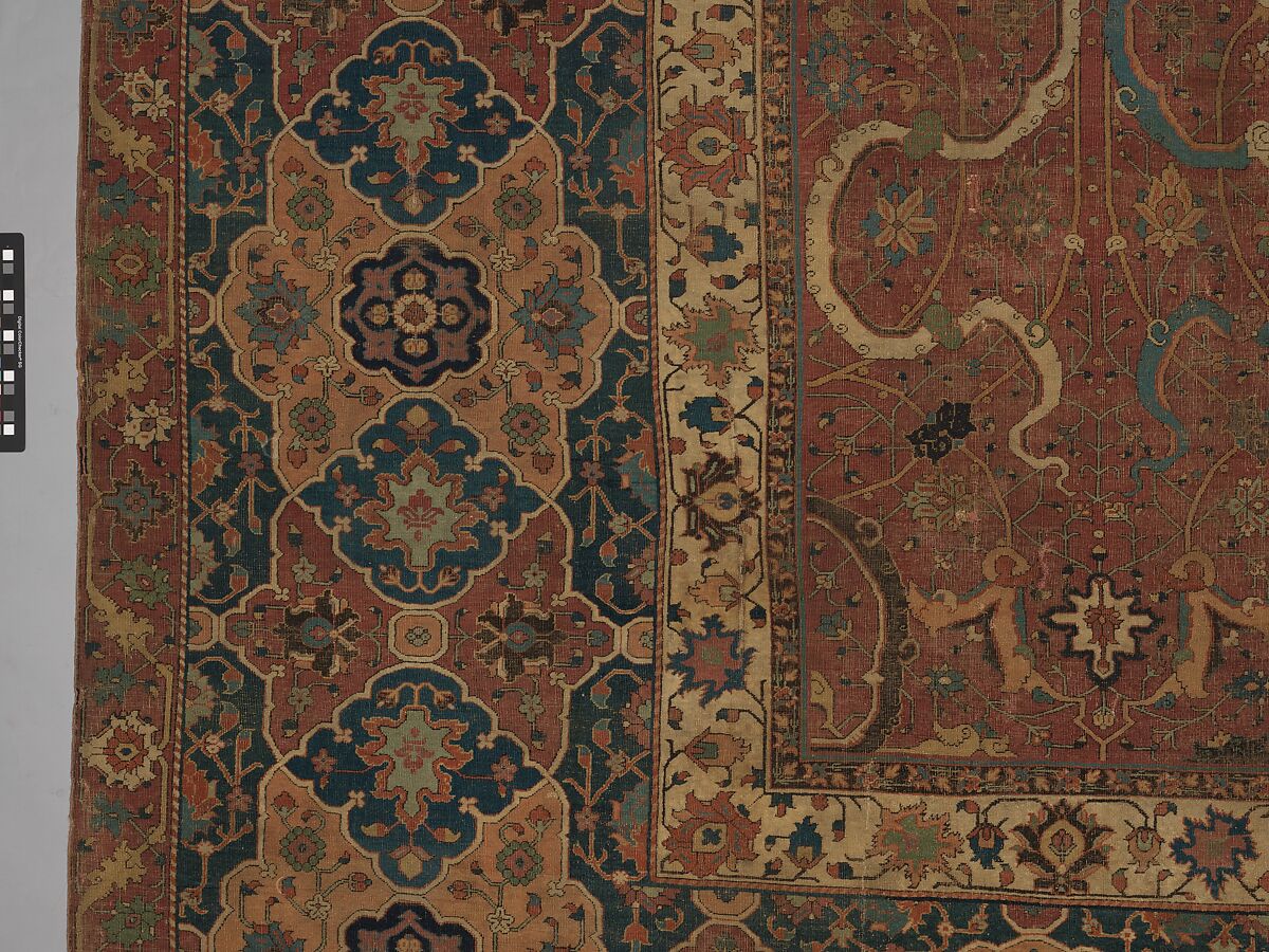 Carpet, Cotton (warp and weft), wool (pile); asymmetrically knotted pile 