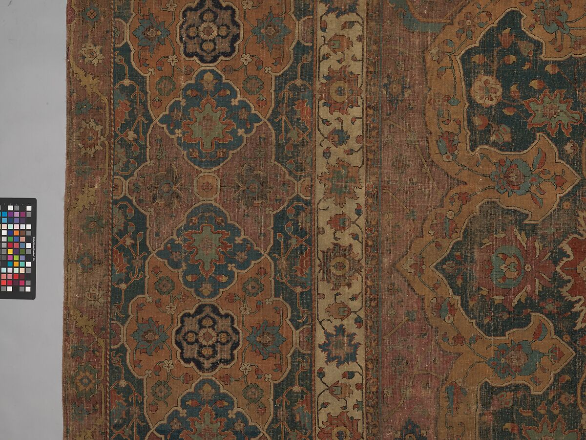 Carpet, Cotton (warp and weft), wool (pile); asymmetrically knotted pile 