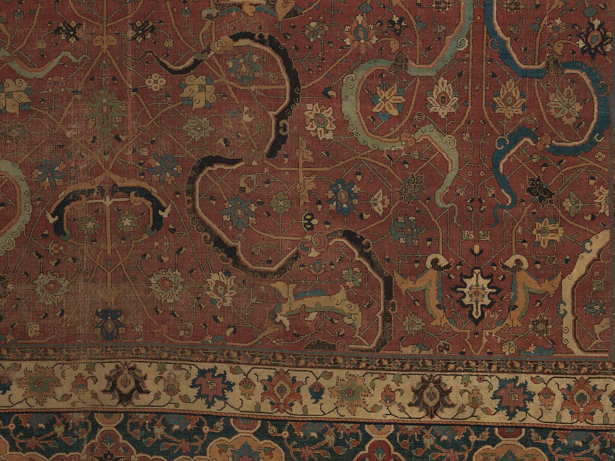 Carpet, Cotton (warp and weft), wool (pile); asymmetrically knotted pile 
