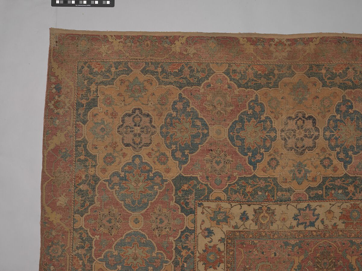 Carpet, Cotton (warp and weft), wool (pile); asymmetrically knotted pile 