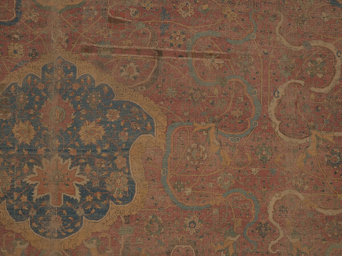 Carpet, Cotton (warp and weft), wool (pile); asymmetrically knotted pile 