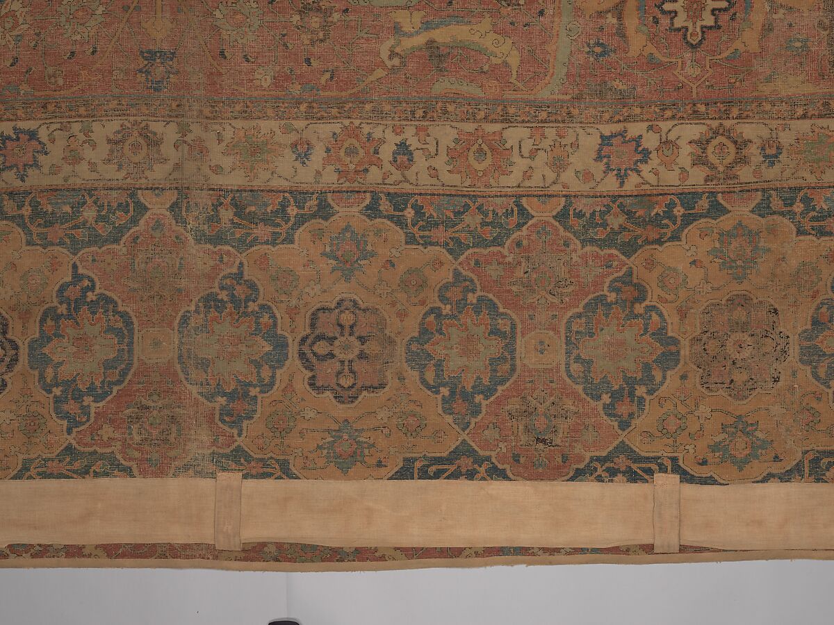 Carpet, Cotton (warp and weft), wool (pile); asymmetrically knotted pile 