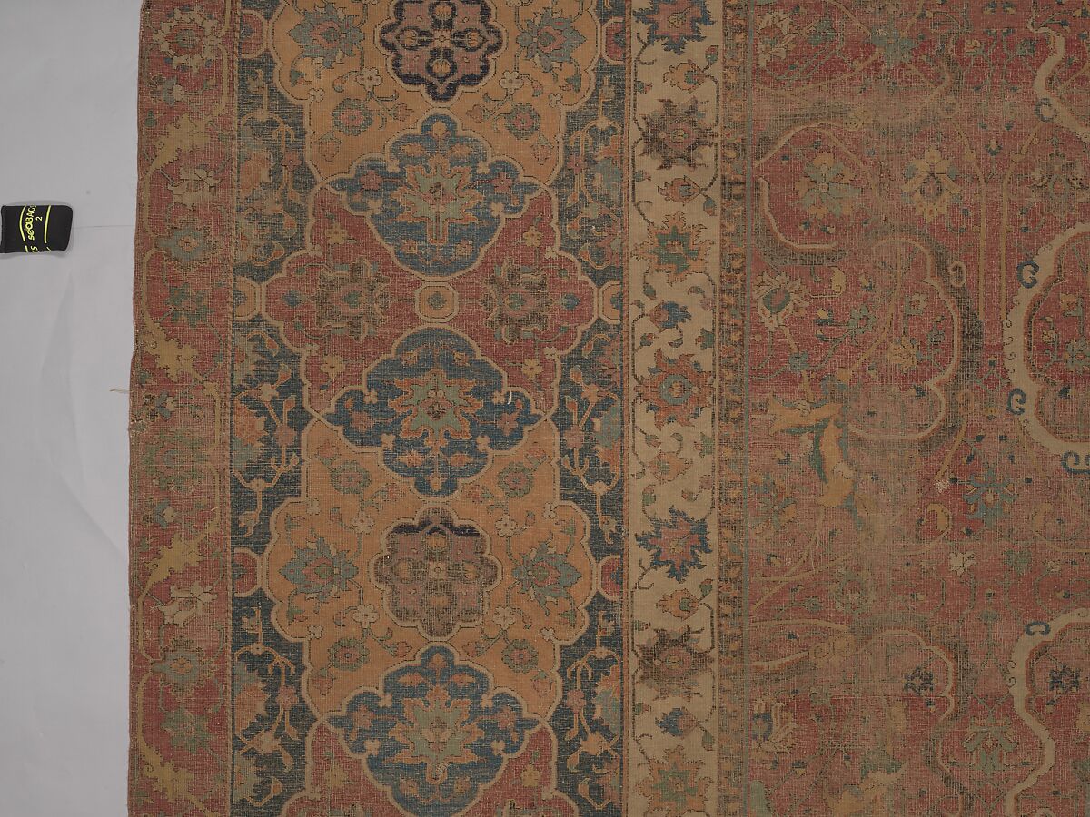 Carpet, Cotton (warp and weft), wool (pile); asymmetrically knotted pile 
