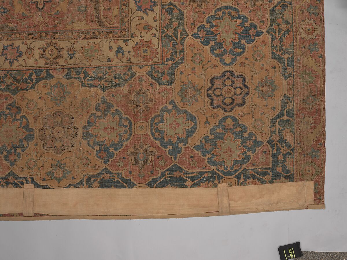 Carpet, Cotton (warp and weft), wool (pile); asymmetrically knotted pile 