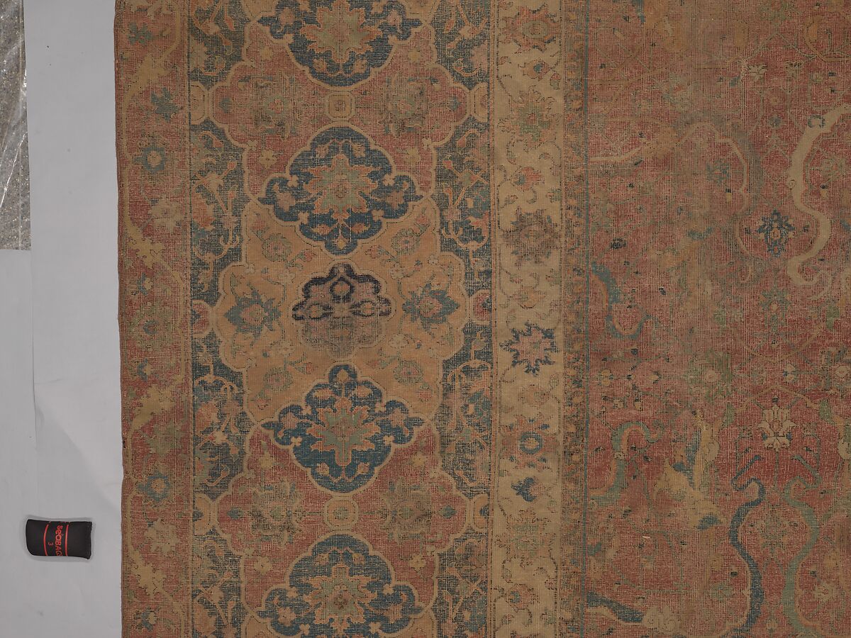 Carpet, Cotton (warp and weft), wool (pile); asymmetrically knotted pile 