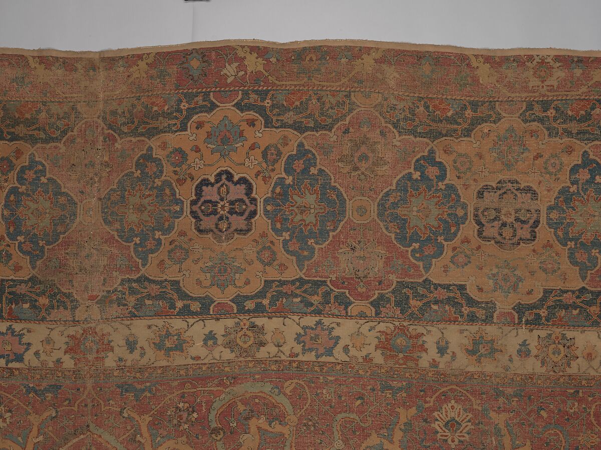 Carpet, Cotton (warp and weft), wool (pile); asymmetrically knotted pile 