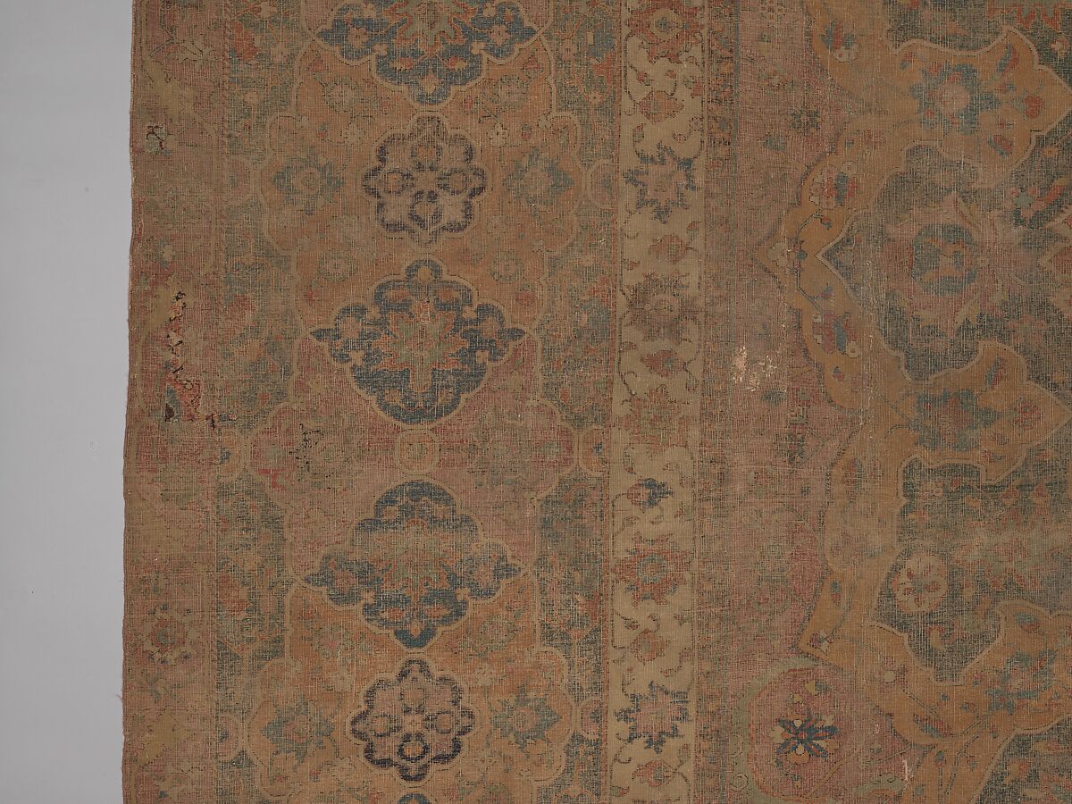 Carpet, Cotton (warp and weft), wool (pile); asymmetrically knotted pile 