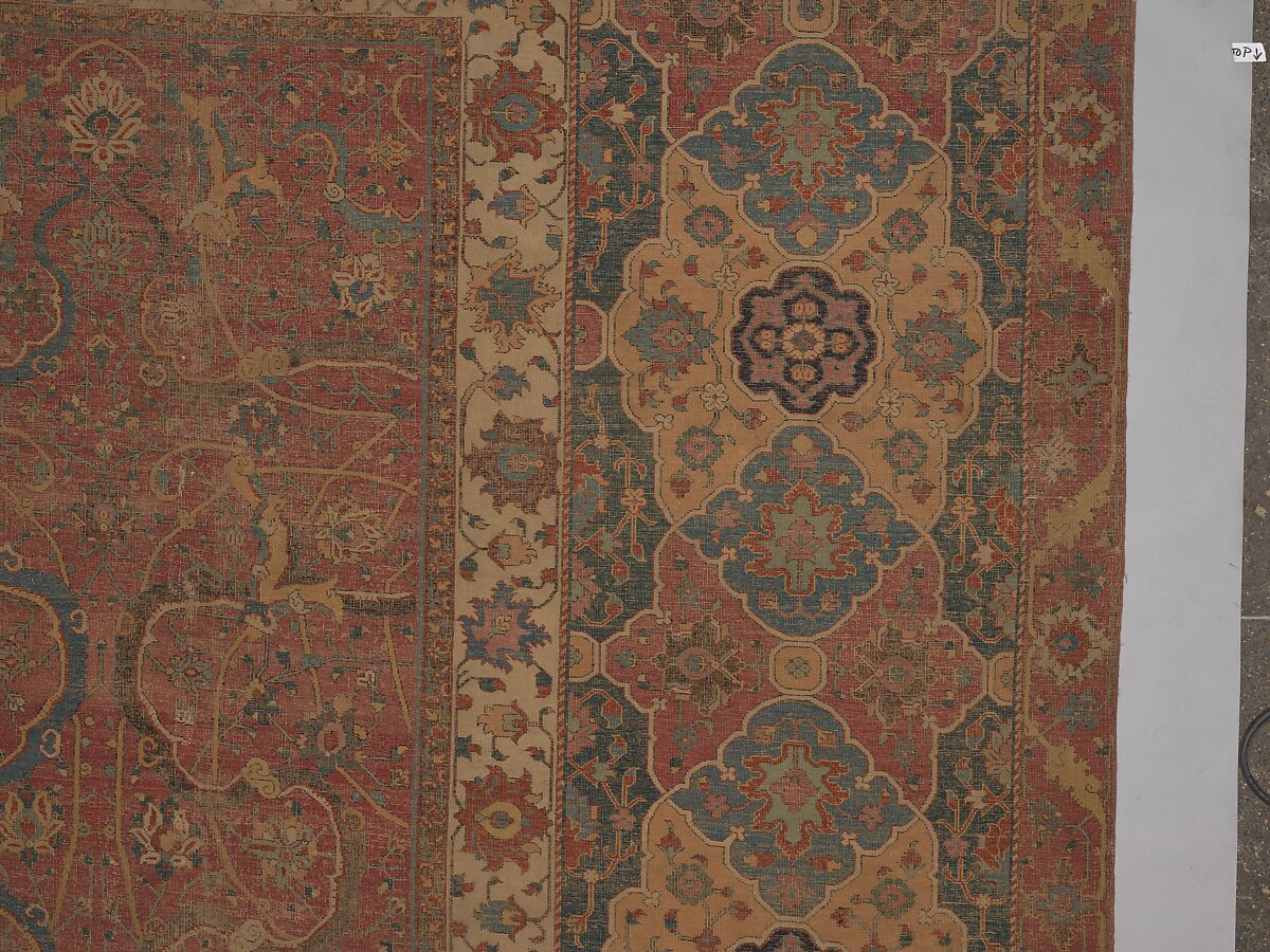 Carpet, Cotton (warp and weft), wool (pile); asymmetrically knotted pile 