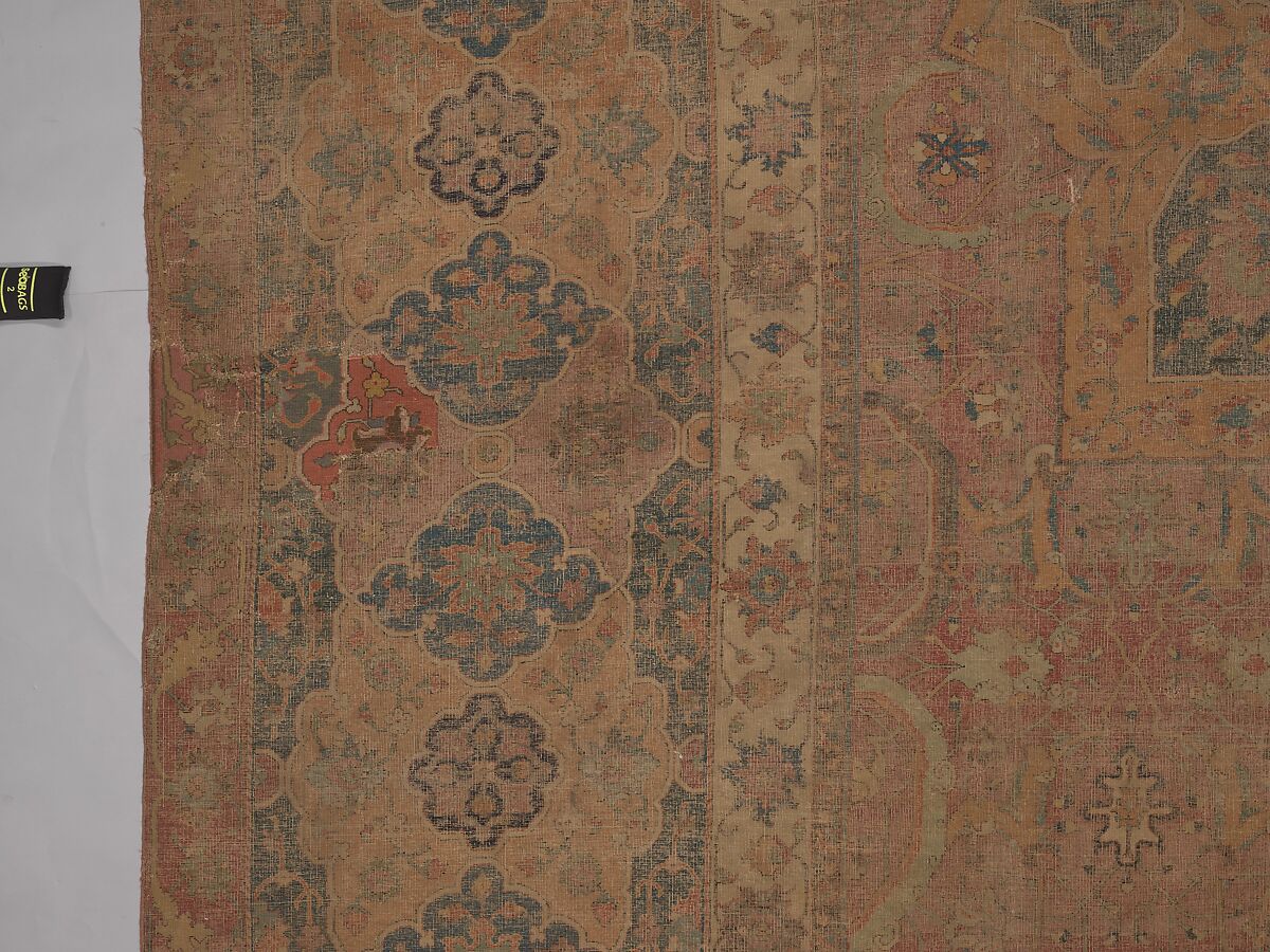 Carpet, Cotton (warp and weft), wool (pile); asymmetrically knotted pile 