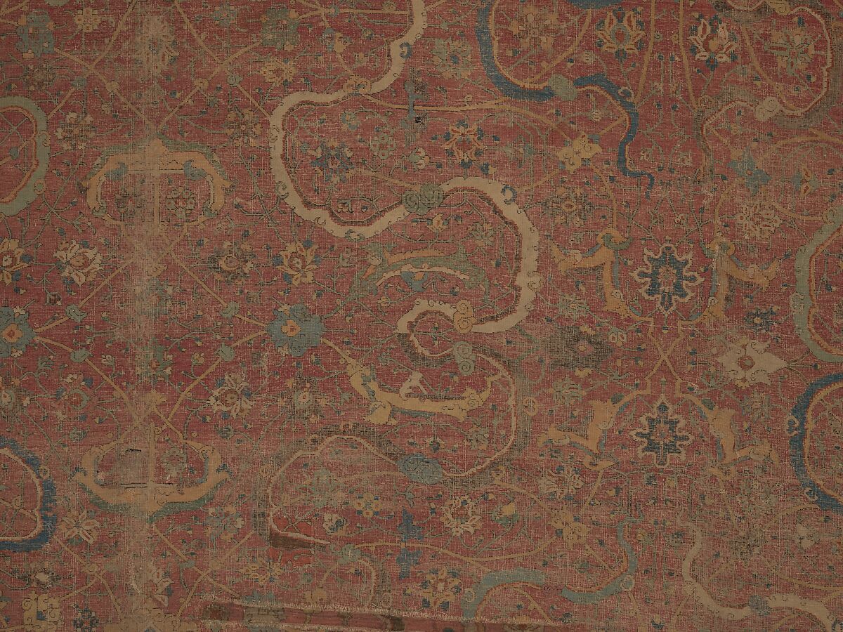 Carpet, Cotton (warp and weft), wool (pile); asymmetrically knotted pile 